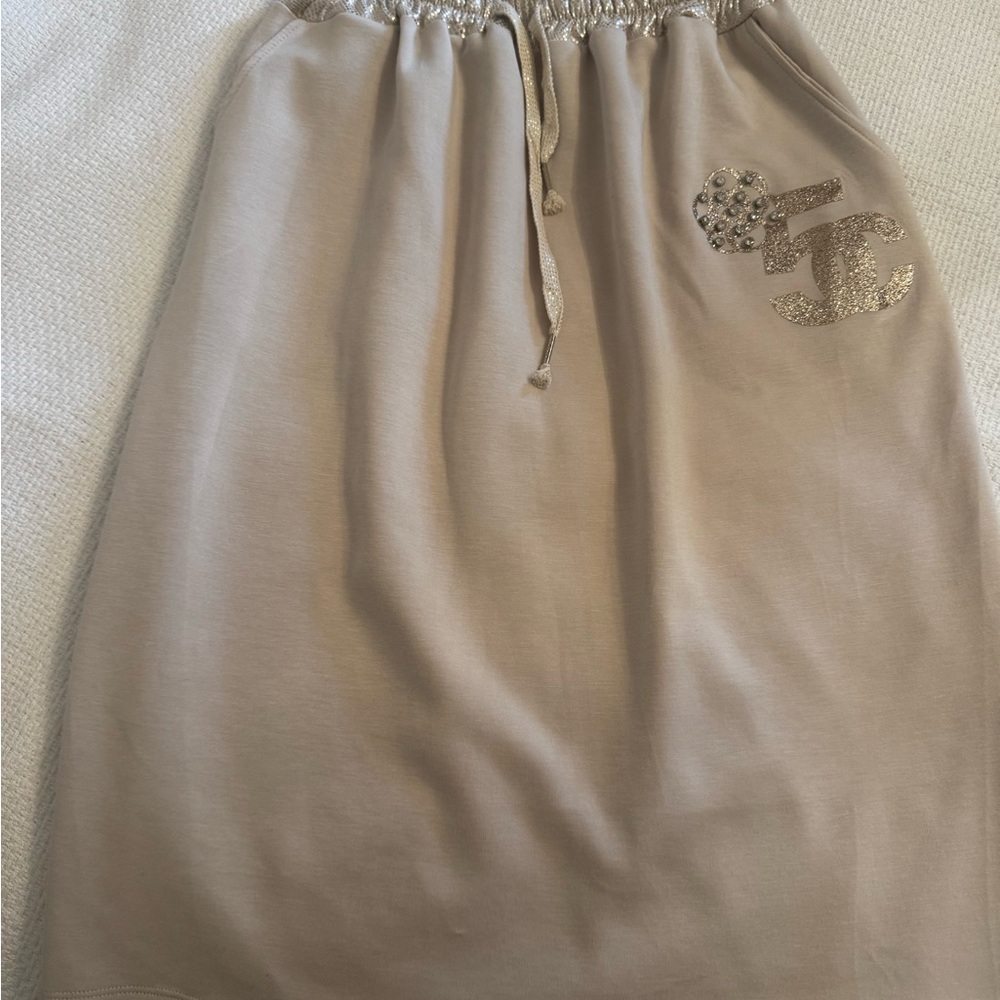 Elegant Beige Skirt with Embellished Logo